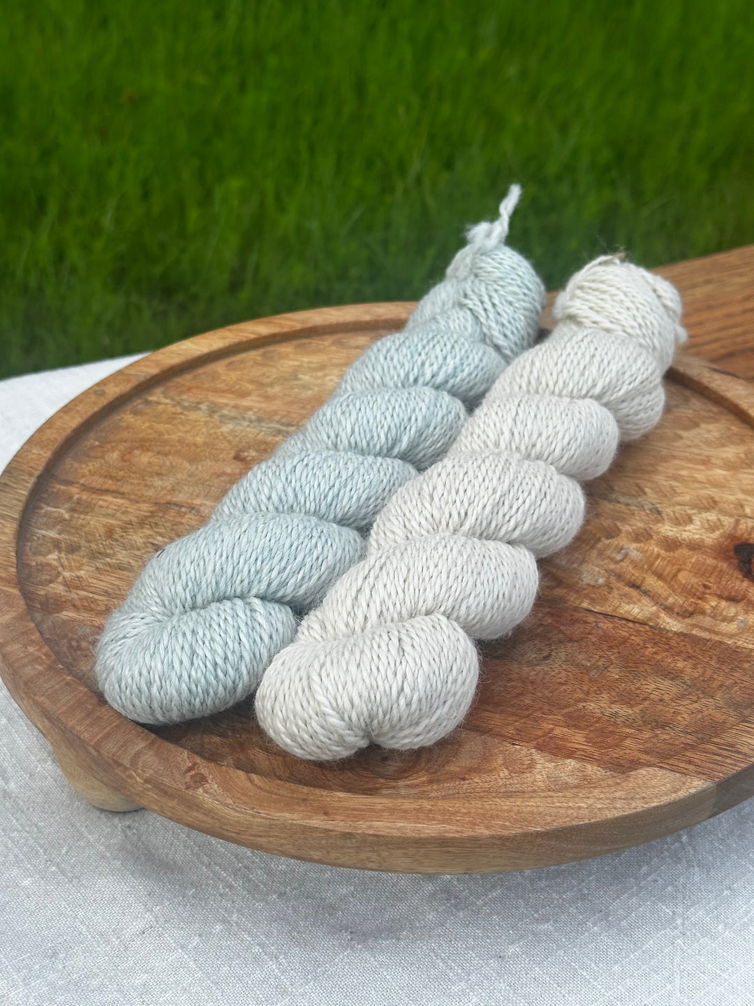 Comparison of Seafoam on left and White Sails on the right.